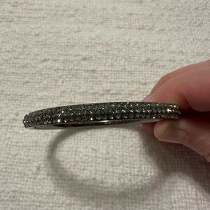 Gray Kate Spade bangle bracelet with rhinestones